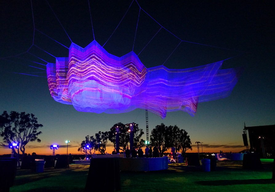 Janet Echelman's art work is a visual art selection for this year's theme:The Light of Discovery